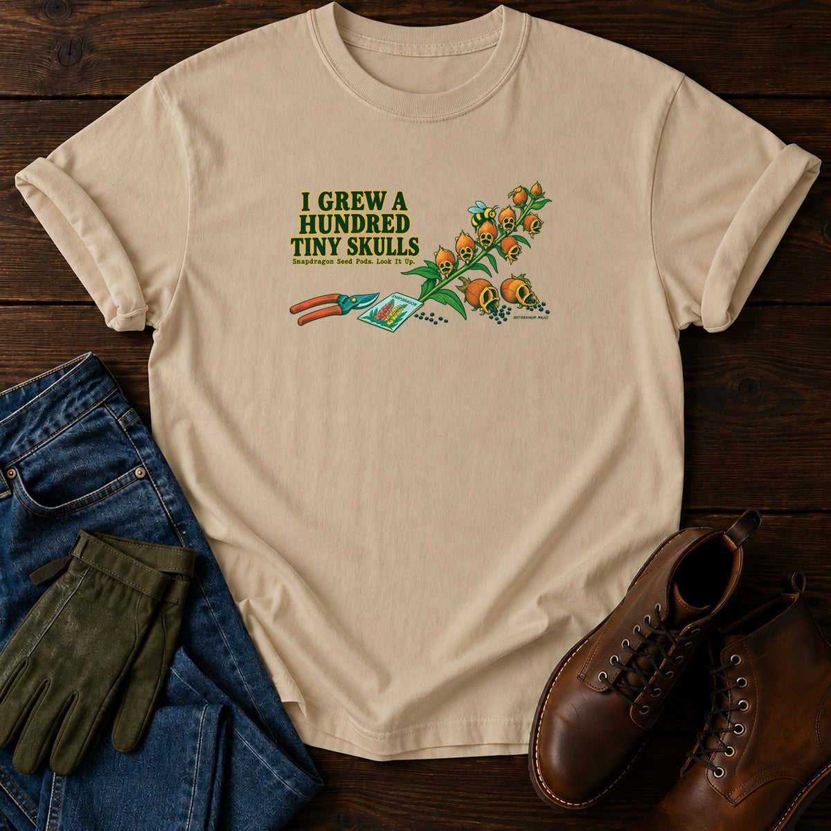 I Grew A Hundred Tiny Skulls Snapdragon T-Shirt — Sandstone