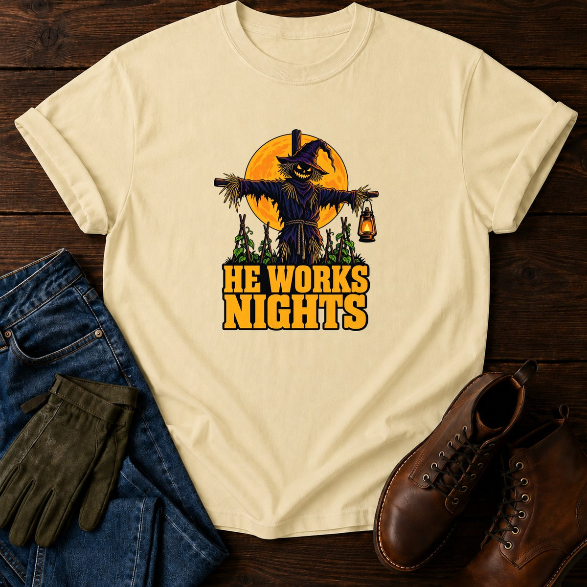 He Works Nights Scarecrow Halloween Garden T-Shirt — Butter